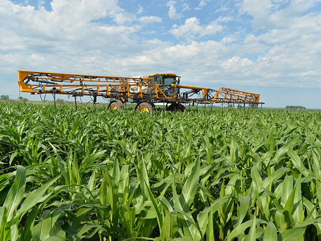 Hagie high-clearance, front-mount sprayers work well for mid- and late-season applications of nutrients on corn. (DTN/The Progressive Farmer photo by Bob Elbert)